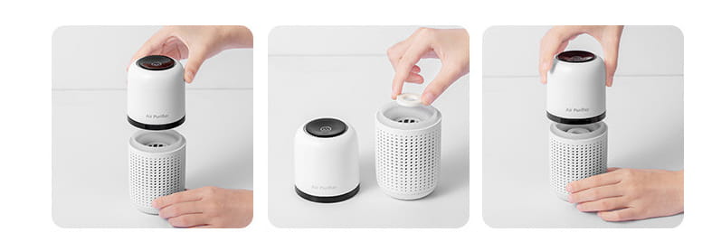 White cylindrical car air purifier with adjustable top and negative ion technology.