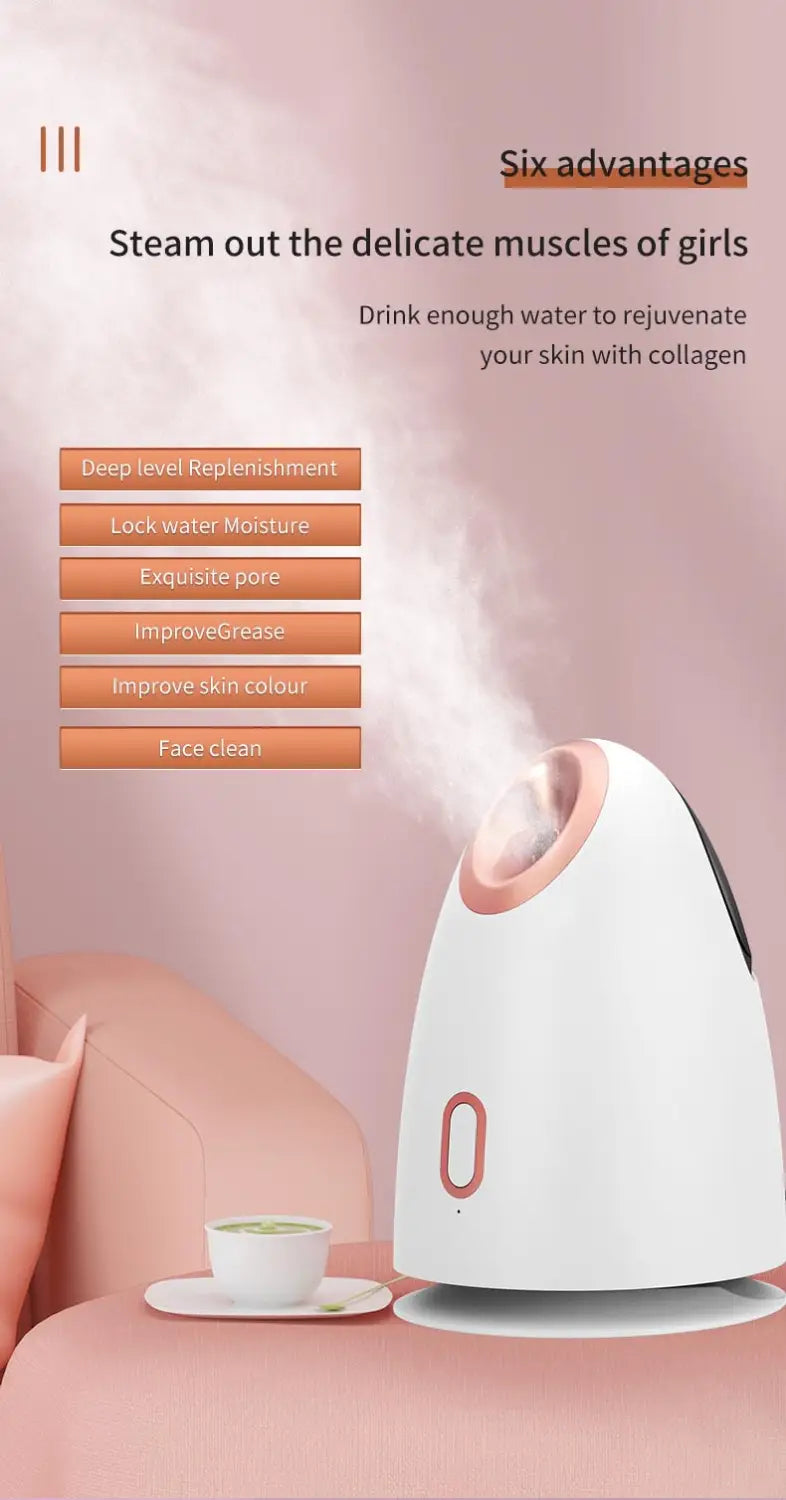 White Nano Ionic Face Steamer on a pink background for home facial spa treatments.