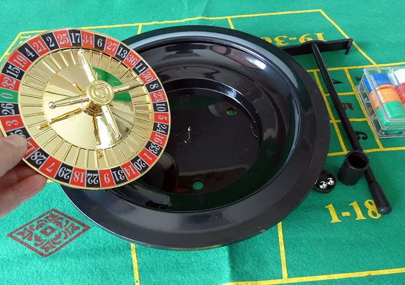 Roulette wheel on green felt for 10 Inch Roulette Set Game with chips and beads.