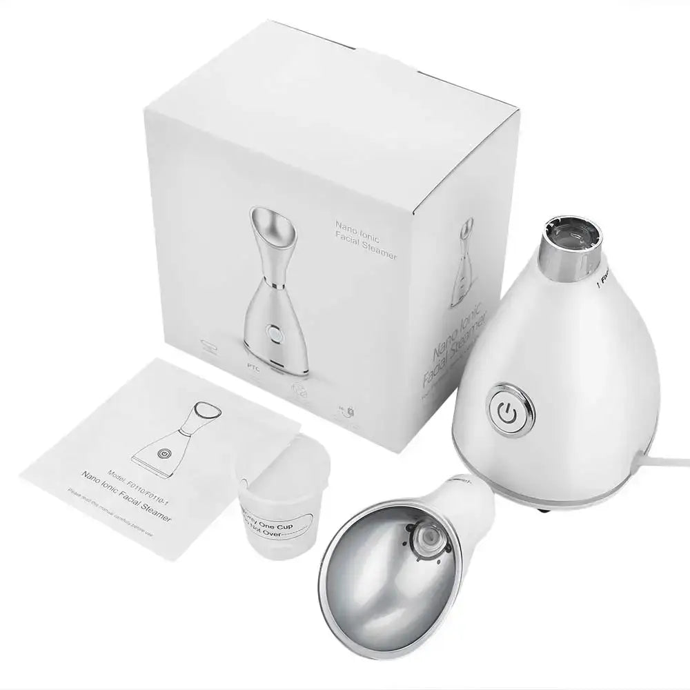 Teardrop-shaped Nano Ionic Facial Steamer with silver attachment and accessories for hot steam facial.