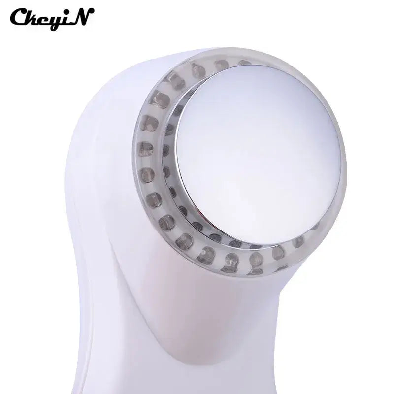 White handheld facial cleansing brush with LED light for the 7 Colors Photon Face Care.