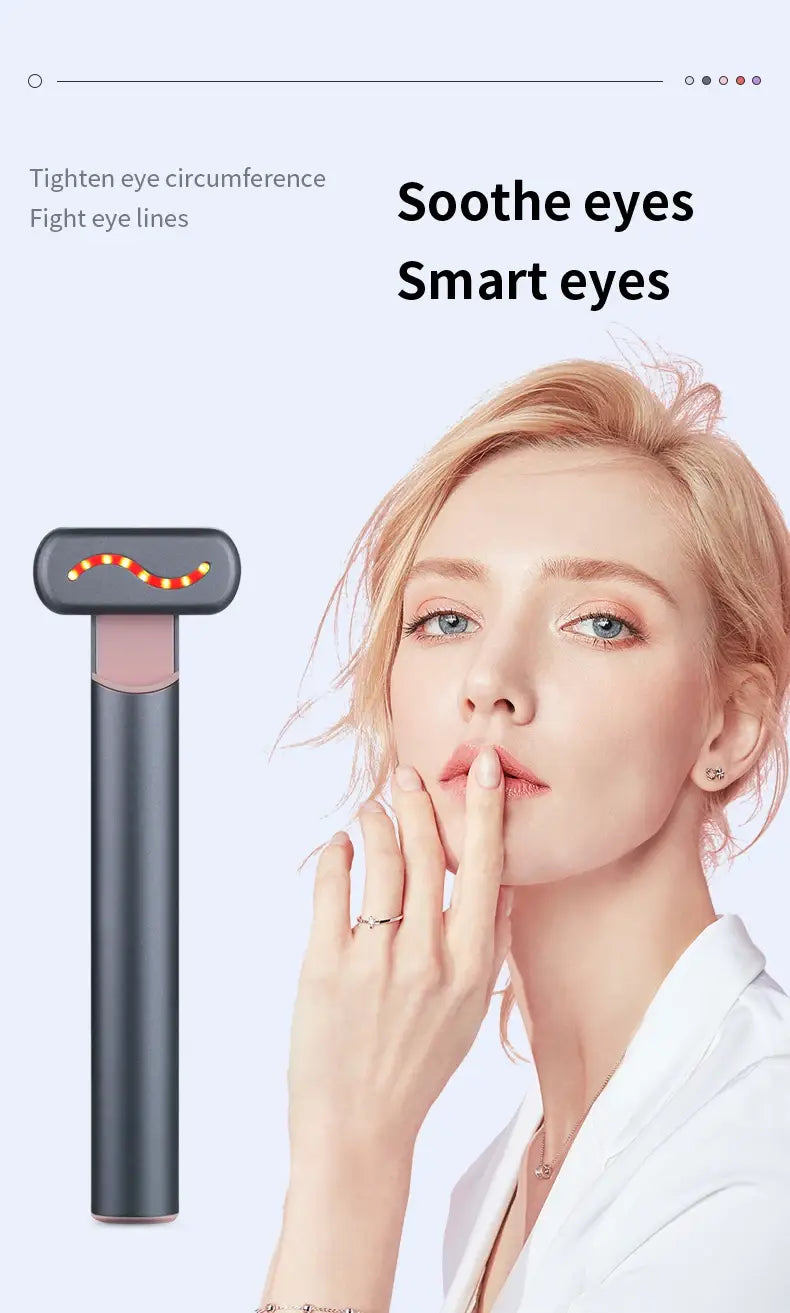 LED Eye Massager with orange-lit head for rejuvenating facial therapy and skin revitalization.